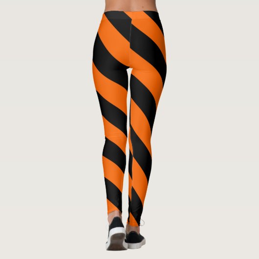 Oranje en zwarte hekstripes leggings (Achterkant)