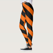 Oranje en zwarte hekstripes leggings (Links)