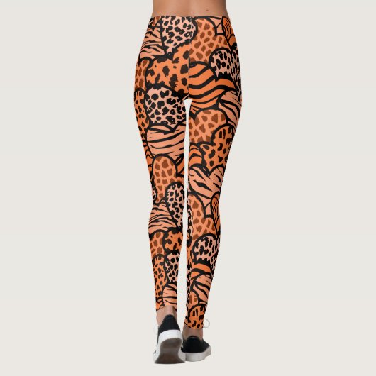Oranje en zwarte meisjesachtige dierenprint harten leggings (Achterkant)