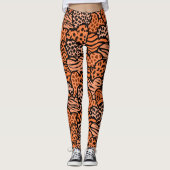 Oranje en zwarte meisjesachtige dierenprint harten leggings (Voorkant)
