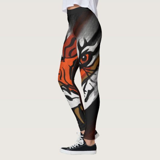 ORANJE EN ZWARTE STRIPEN LEGGINGS (Links)
