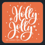 Oranje feestdag Holly Jolly Hand Lettered Vierkante Sticker<br><div class="desc">Oranje feestelijke Holly Jolly Hand Lettered Holiday Sticker |  vakantiewijn met met handschrift "holly jolly" met sneeuw- en sneeuwvlokken. Aanpassen door eigen teksten toe te voegen. Dit zal perfect zijn voor kerstuitnodigingen,  kaarten,  geschenken en feestvieren. Overeenkomende objecten zijn beschikbaar.</div>