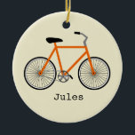 Oranje fiets gepersonaliseerde versiering keramisch ornament<br><div class="desc">Een versiering met een afbeelding van een oranje fiets.  Personaliseer met jouw naam onder de fiets.</div>