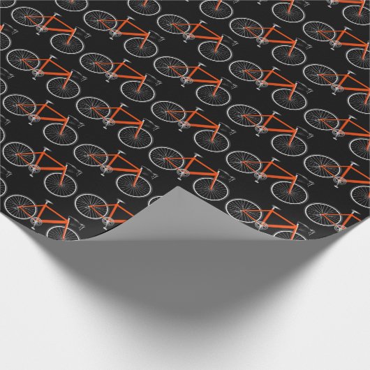 oranje fiets op zwart verpakkingspapier cadeaupapier (Hoek)