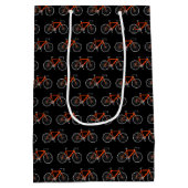 Oranje fiets op zwarte, middelgrote cadeautas (Achterkant)