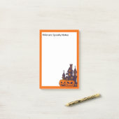 Oranje frame, griezelig huis en pompoenen post-it® notes (Op bureau)