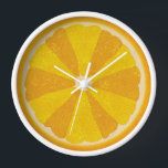 Oranje fruit Slice Pop Art Minimalist Kitchen Food<br><div class="desc">Deze kleurrijke oranje klok is perfect voor je keukendecor. Het show een gesneden open afbeelding van een oranje citrusvrucht met 12 vruchtensappen in wisselende tinten van sinaasappel, zodat je tijd zonder cijfers kunt zien. Dit ongewone ontwerp heeft een getextureerde look - en een soort pop-kunst van 60 jaar / minimalistische...</div>