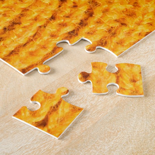 Oranje gebreide trui, gestructureerde achtergrond. legpuzzel (Zijkant)