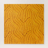 Oranje gebreide trui, gestructureerde achtergrond. legpuzzel (Verticaal)