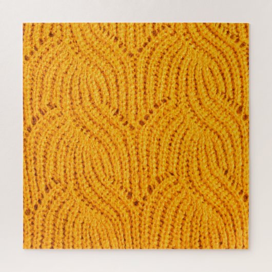 Oranje gebreide trui, gestructureerde achtergrond. legpuzzel (Verticaal)