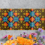 Oranje geel blauw symmetrische arrangementen tegeltje<br><div class="desc">Deze keramische tegel heeft een prachtig patroon dat het oog in een dans van kleur en vorm trekt. Het ingewikkelde ontwerp wordt gekenmerkt door symmetrische arrangementen van levendige tinten, waardoor een optische illusie-effect ontstaat. De vurige oranje vormen, gelijkend op ogen of bladeren, staan centraal in het patroon en stralen een...</div>