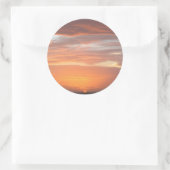 Oranje gekleurde hemel ronde sticker (Tas)