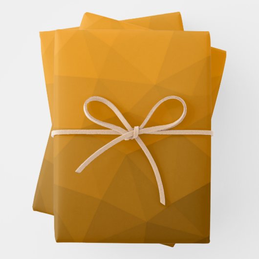 Oranje geometrisch maaspatroon van de gradiënt inpakpapier vel (In situ)