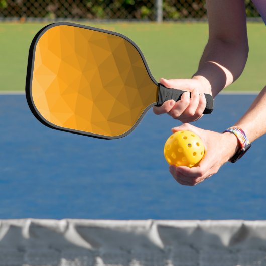 Oranje geometrisch maaspatroon van de gradiënt pickleball paddle (Insitu)