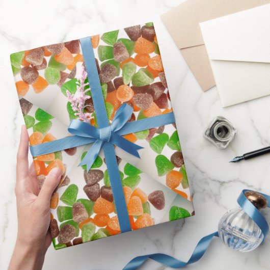 Oranje groene rode kauwgom snoep besprenkeld suike cadeaupapier (Geschenken)