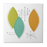 Oranje groene Tuquoise Surfboard Vormen Mid Centur Tegeltje<br><div class="desc">Deze funky mid-eeuwse keramische tegel,  met zijn turquoise,  groene en oranje ornamenten vormen en zwarte starbursts,  voegt een vleugje kleur toe aan uw tegelproject of als accentstuk.</div>