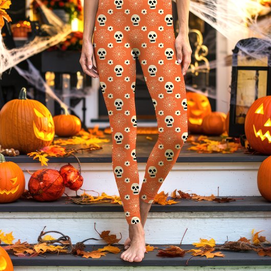 Oranje Halloween schedels en bloemen Leggings