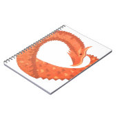 Oranje hartdraak op wit notitieboek (Linkerzijde)