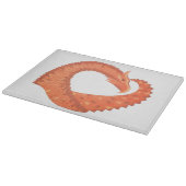 Oranje hartdraak op wit snijplank (Hoek)