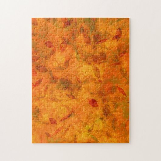 Oranje herfstbladeren op stof legpuzzel (Verticaal)