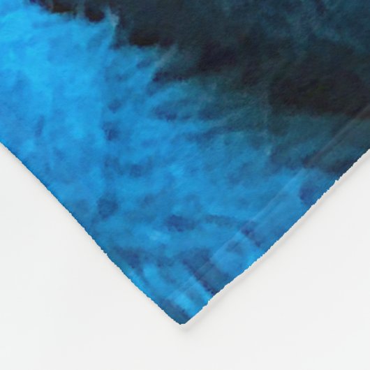 Oranje kat kromp op blauwe deken (Hoek)