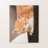 Oranje kat op zwarte ottoman/Oranje kitten Legpuzzel (Verticaal)