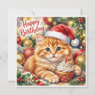 Oranje katje met cupcake in kerstmannenhoed. Verja Feestdagenkaart