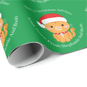 Oranje kerstcadeau op groen cadeaupapier (Rol Hoek)