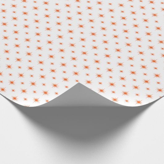 Oranje kerstrecorder met een springplank cadeaupapier (Hoek)