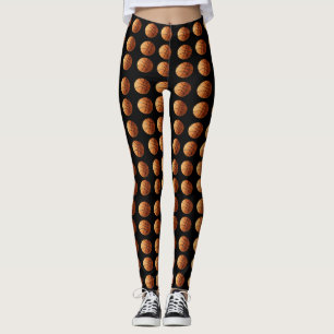 Oranje kogelballen op zwart, leggings
