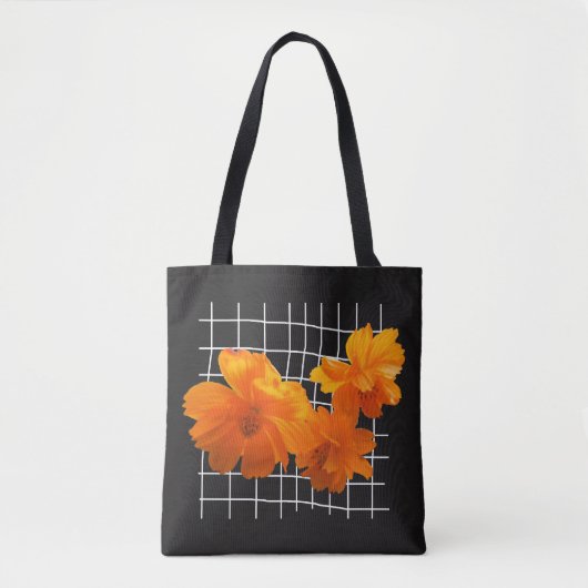Oranje kosmos ventilator op wit raster op zwart tote bag (Voorkant)
