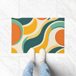 Oranje kringen en kleurstromen deurmat