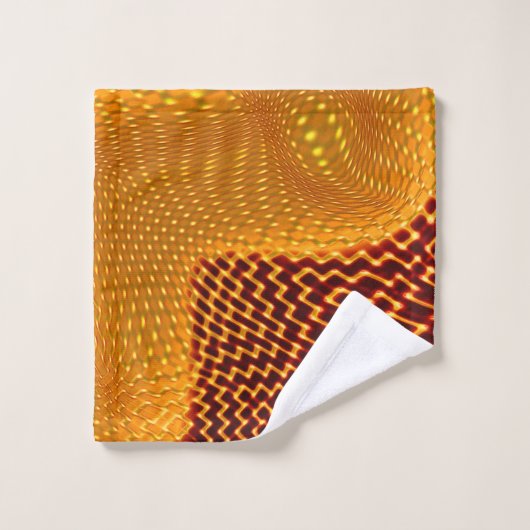 Oranje kromme en gouden punten op de bruine achter bad handdoek (Wasdoekje)