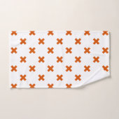 Oranje kruisstiften op wit handdoek (Handdoek)