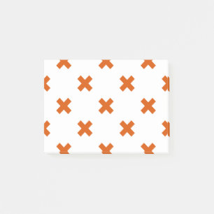 Oranje kruisstiften op wit post-it® notes