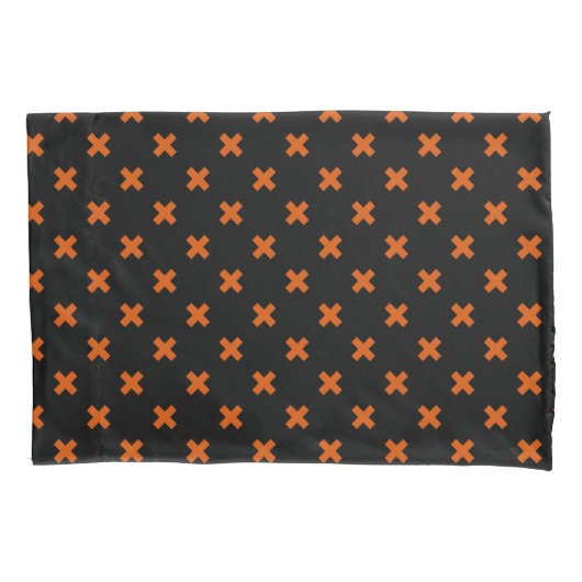 Oranje kruisstiften op zwart kussensloop (Voorkant)