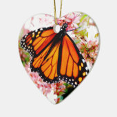 Oranje Monarch op roze bloemen Keramisch Ornament (Links)