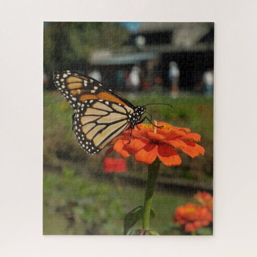 Oranje monarchvlinder tijdens Kaapse meitrek Legpuzzel (Verticaal)