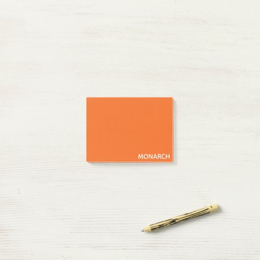 Oranje monboogvlinder post-it® notes (Op bureau)