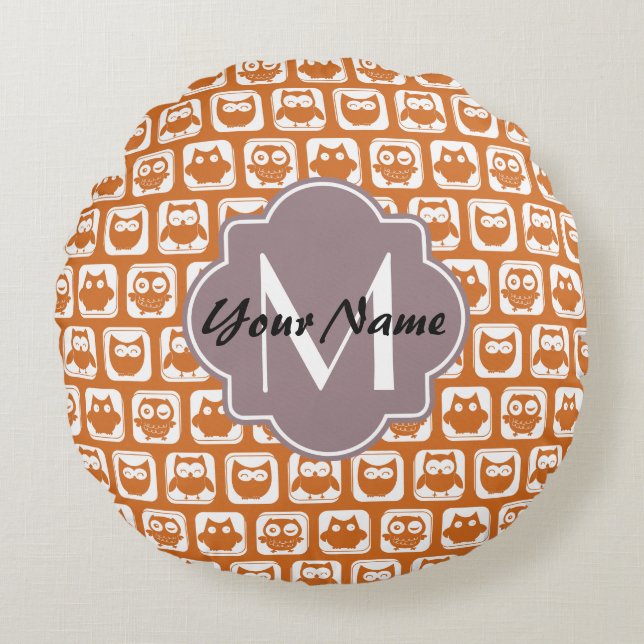 Oranje monogrammen rond kussen (Voorkant)