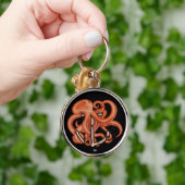 Oranje octopus boven anker sleutelhanger (Hand)
