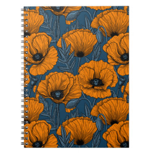 Oranje papaver op donkerblauw notitieboek