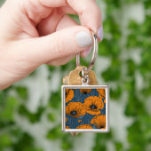 Oranje papaver op donkerblauw sleutelhanger (Hand)