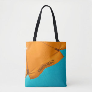 Oranje paraplu's die op het strand zijn gedrukt tote bag