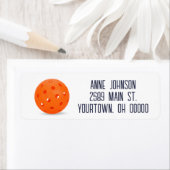 Oranje pickleball op wit etiket (Insitu)