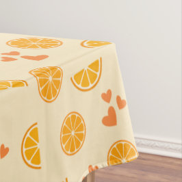 Oranje plakjes en harten tafelkleed
