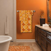 Oranje plakken in verbrand sinaasappel bad handdoek