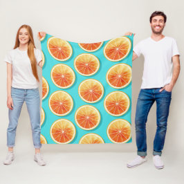 Oranje plakken op blauw fleece deken