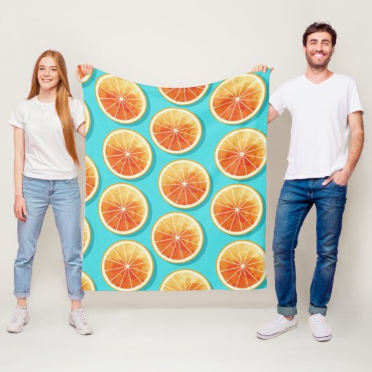Oranje plakken op blauw fleece deken (In situ)