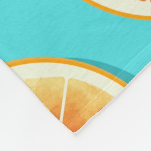 Oranje plakken op blauw fleece deken (Hoek)